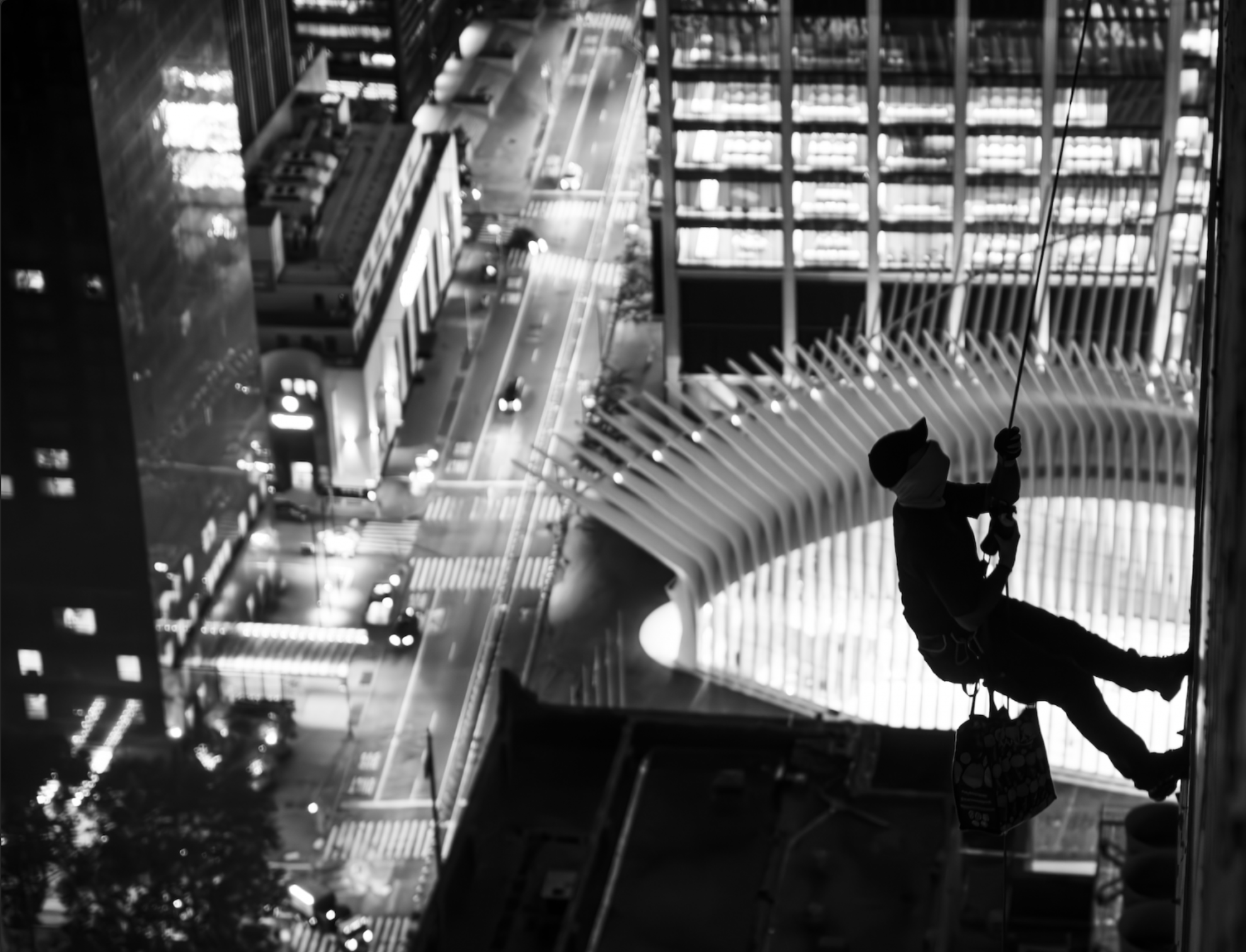 The tagger RAMS, rappelling an NYC high-rise. Photo by: Issac Wright